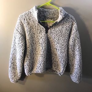 Super soft and puffy pullover sweater-XS-quarter zip with an adjustable bottom.